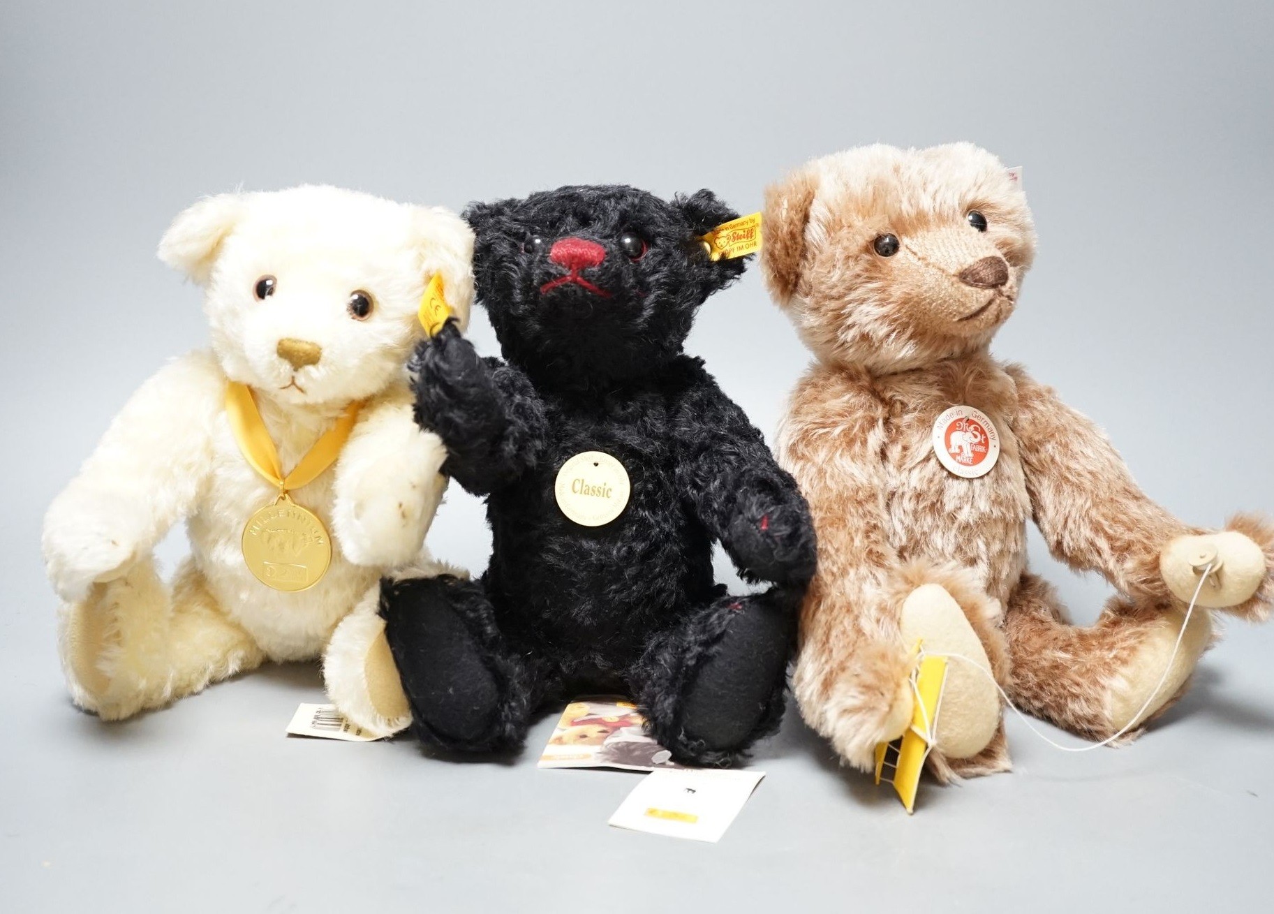 A Steiff Teddy Rolo Plan, 30cm, box and certificate, White label, with Steiff Yellow tag Millenium Bear for Danbury Mint, with certificate